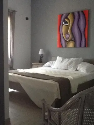 Letto o letti in una camera di La Fenice