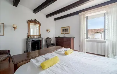 Letto o letti in una camera di Villa Poss