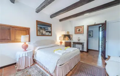 Letto o letti in una camera di Villa Poss