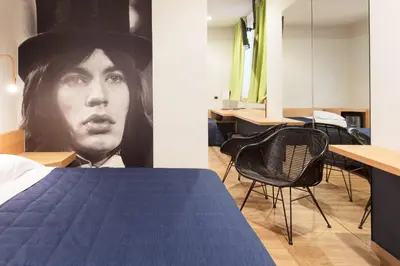 Letto o letti in una camera di Garda Hotel