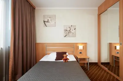 Letto o letti in una camera di Garda Hotel