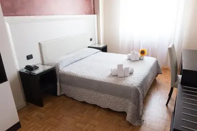 Letto o letti in una camera di Hotel Astoria