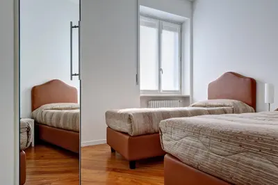 Letto o letti in una camera di My House Apartments