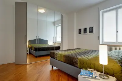 Letto o letti in una camera di My House Apartments