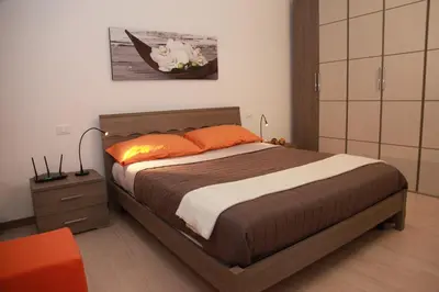 Letto o letti in una camera di Home Sweet Home
