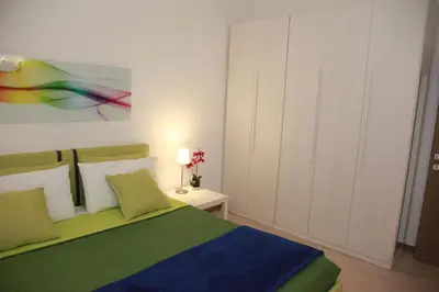 Letto o letti in una camera di Home Sweet Home