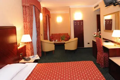 Letto o letti in una camera di Hotel La Spia D'Italia