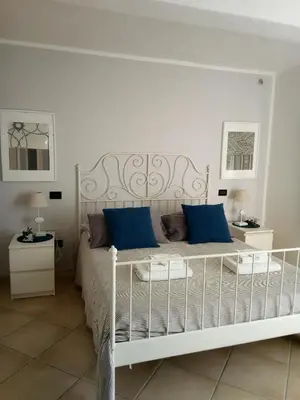 Letto o letti in una camera di Villa Venino