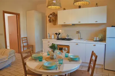 Cucina o angolo cottura di Appartamento con giardino Dolcemare