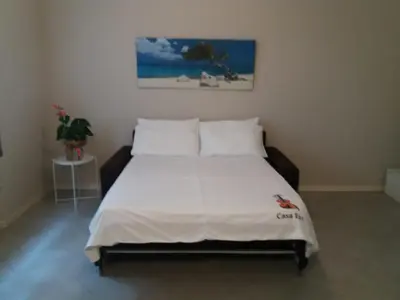 Letto o letti in una camera di Casa Eva 2010