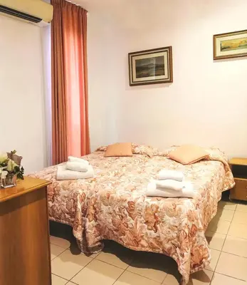 Letto o letti in una camera di Hotel Europa
