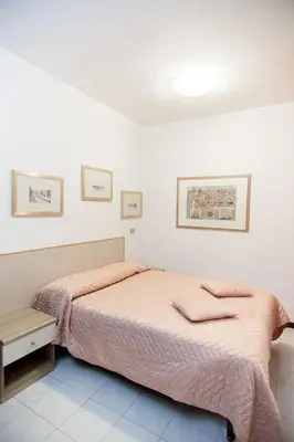 Letto o letti in una camera di Hotel Europa