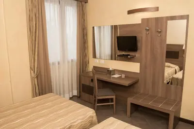 Letto o letti in una camera di Hotel Corte Business