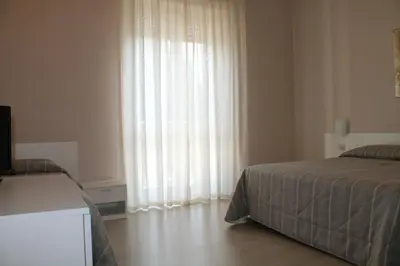 Letto o letti in una camera di Hotel Cremona Viale