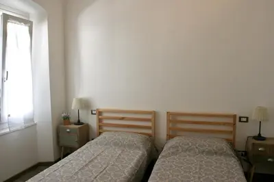 Letto o letti in una camera di Marco's House
