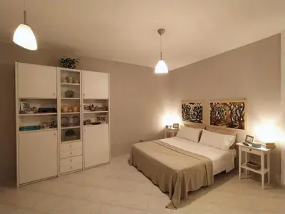 Letto o letti in una camera di A due passi dal mare