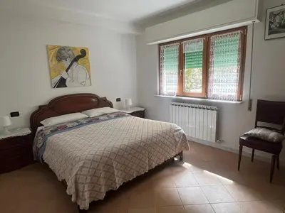 Letto o letti in una camera di Appartamento vicino al mare