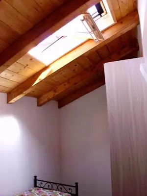 Letto o letti in una camera di Casa Natale