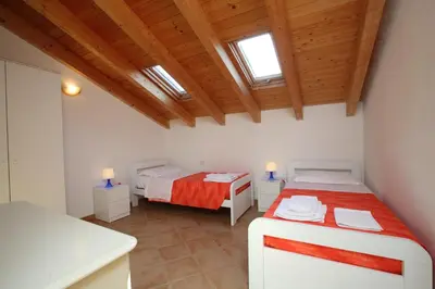 Letto o letti in una camera di La casa al mare
