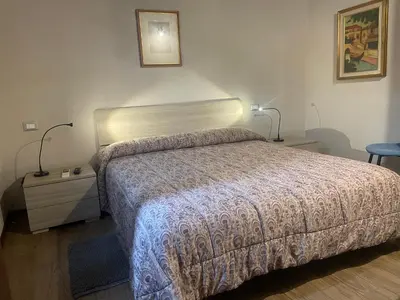 Letto o letti in una camera di La casa di Enea