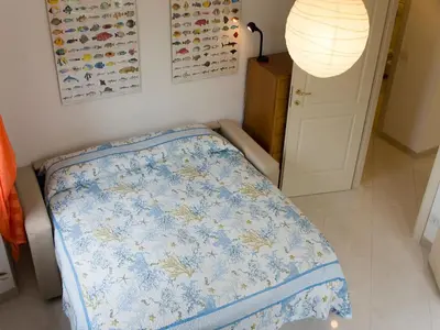 Letto o letti in una camera di Libra Flexyrent