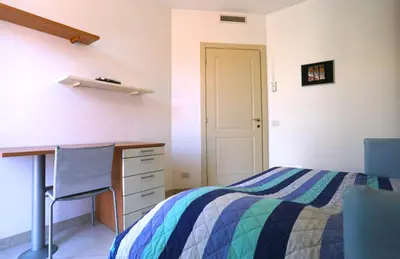 Letto o letti in una camera di Libra Flexyrent