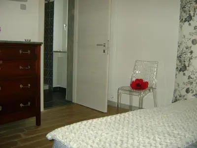 Letto o letti in una camera di B&B Agorà Sarzana
