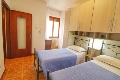 Letto o letti in una camera di Al Numero 16