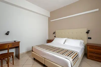 Letto o letti in una camera di A Casa Dei Gonzaga, MantegnaHotels