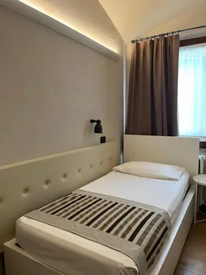 Letto o letti in una camera di A Casa Dei Gonzaga, MantegnaHotels