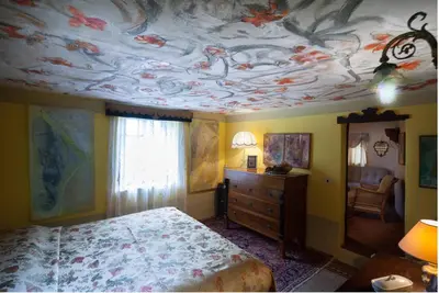 Letto o letti in una camera di Al Museo