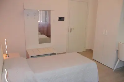 Letto o letti in una camera di Affittacamere La Perla