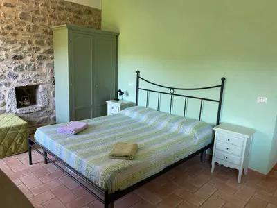 Letto o letti in una camera di Mini Appartamenti Nonna Nella