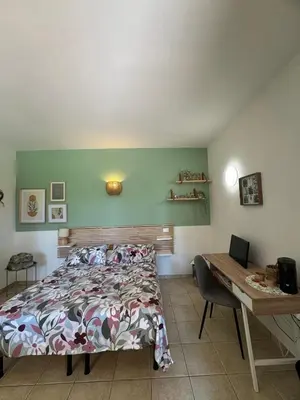 Letto o letti in una camera di Agriturismo Corte San Girolamo