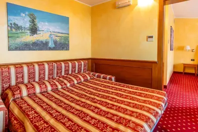 Letto o letti in una camera di LVG Hotel Collection - Riz