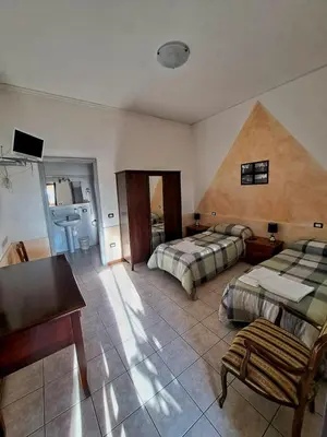 Letto o letti in una camera di Affittacamere Da Franco