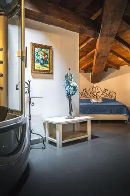 Letto o letti in una camera di Hotel La Tavola Rotonda
