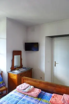 Letto o letti in una camera di Bed and Breakfast Le Quattro Stagioni