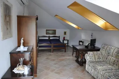 Area soggiorno di Bed & Breakfast 4U PARCHEGGIO INTERNO