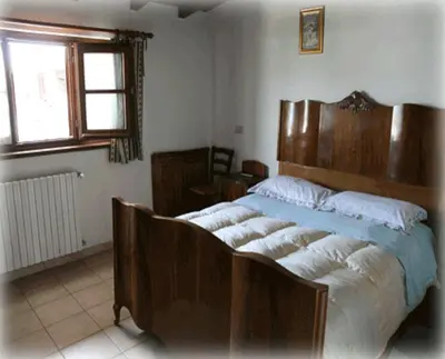 Letto o letti in una camera di Ca Dell'Aglio