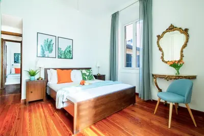 Letto o letti in una camera di Piazza Chiappa Apartment