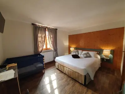 Letto o letti in una camera di Locanda Il Rustichello