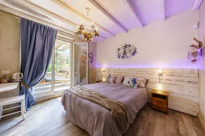 Letto o letti in una camera di La Rocca Maison de Charme
