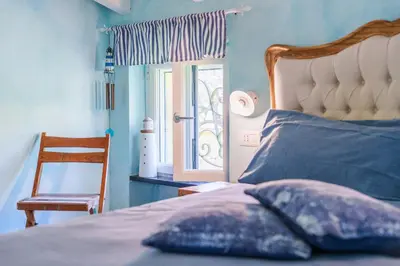 Letto o letti in una camera di La Rocca Maison de Charme