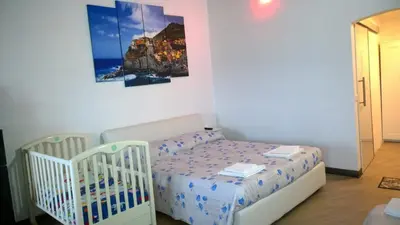 Letto o letti in una camera di Borgo Foce La Spezia