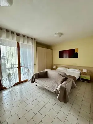 Letto o letti in una camera di Parmigianino Apartments
