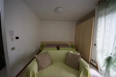 Letto o letti in una camera di Parmigianino Apartments