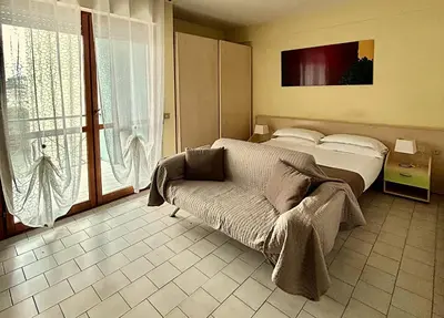 Letto o letti in una camera di Parmigianino Apartments