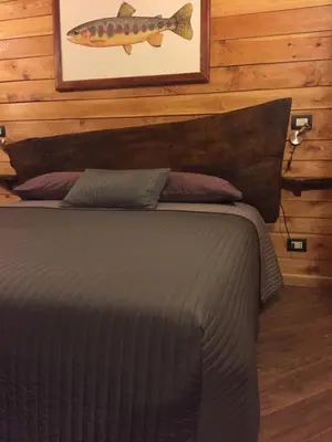 Letto o letti in una camera di Trout Lodge