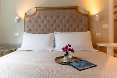 Letto o letti in una camera di Gian Paul Hotel